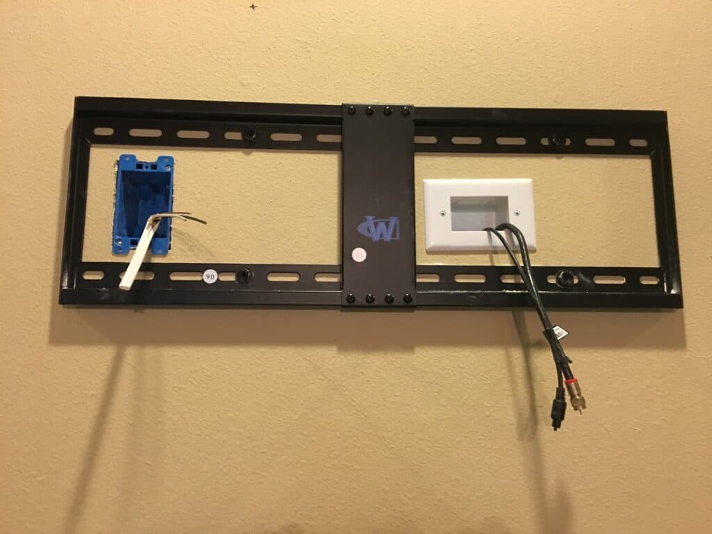 TV Mounting Service -  TV Mounting Bracket - TV wall mounting Installation in progress