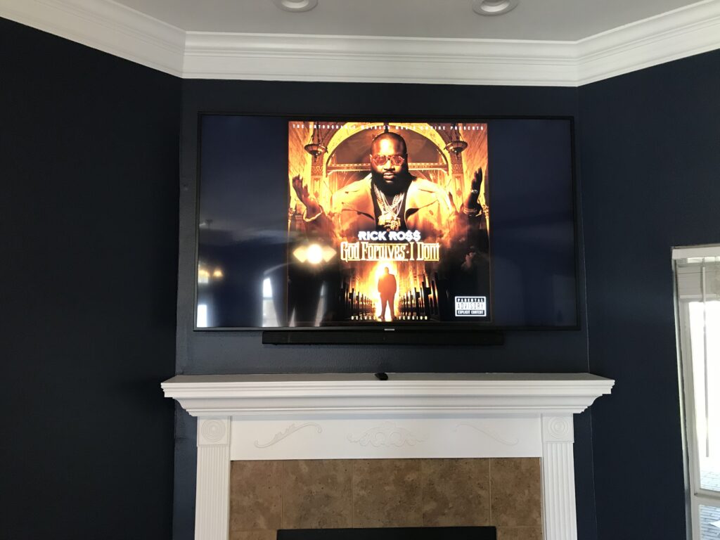TV Mounted over Fireplace Mantel