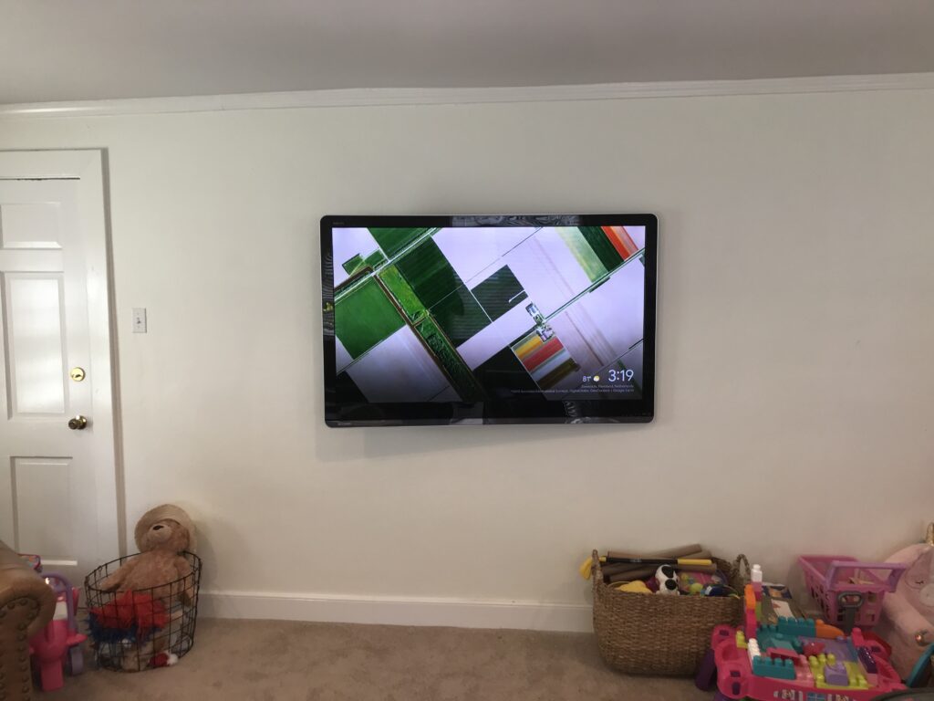 Wall Mount TV Installers TV Mounted using Full Motion Bracket