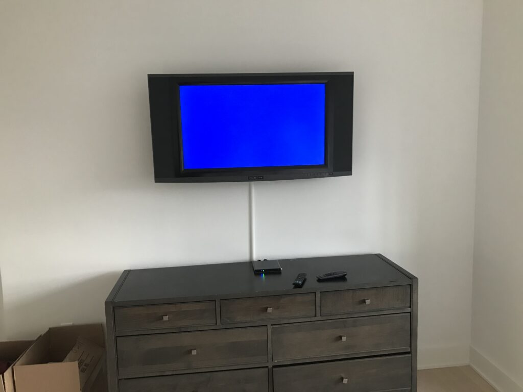 Paintable Wire mold below TV