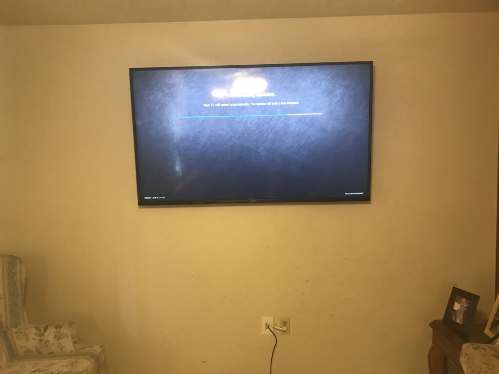 TV Hung using a tilt mount wires concealed